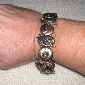 Silver, Gold, and Bronze Mermaid and Waves stretch bracelet